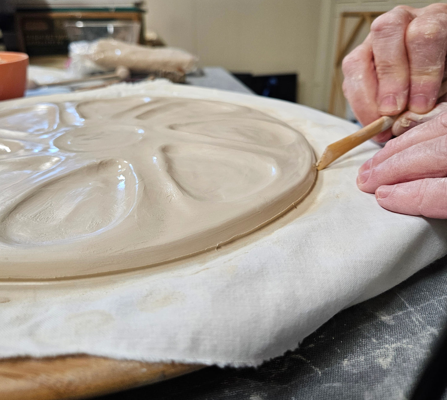 Hand Built Oyster Plate 9" in Green and Lavender Brush Stroke With Orange Center